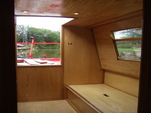 ross boats bespoke narrowboats and boat safety examinations -  - aft, double bed/dinette/seating area - click to see image full size
