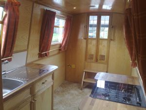 ross boats bespoke narrowboats and boat safety examinations -  - galley/saloon complete with carpet, curtains etc. - click to see image full size